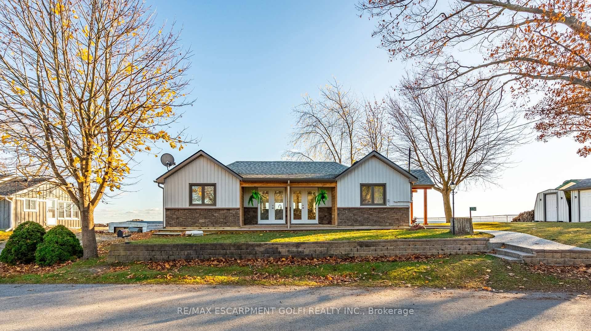 Welcome to this beautifully renovated 2 1 bedroom lakefront retreat, offering 100 feet of private water frontage.