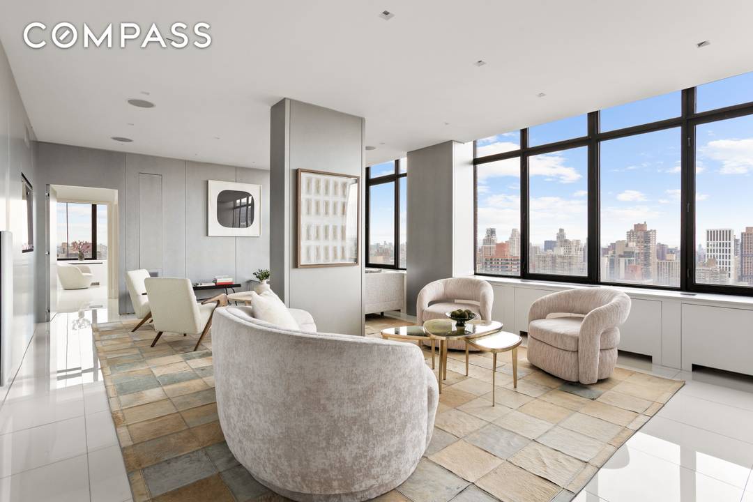 Spanning approximately 6, 050 square feet of interior space and 730 square feet of private outdoor space across five balconies and a large terrace, the home offers sweeping, unobstructed views ...