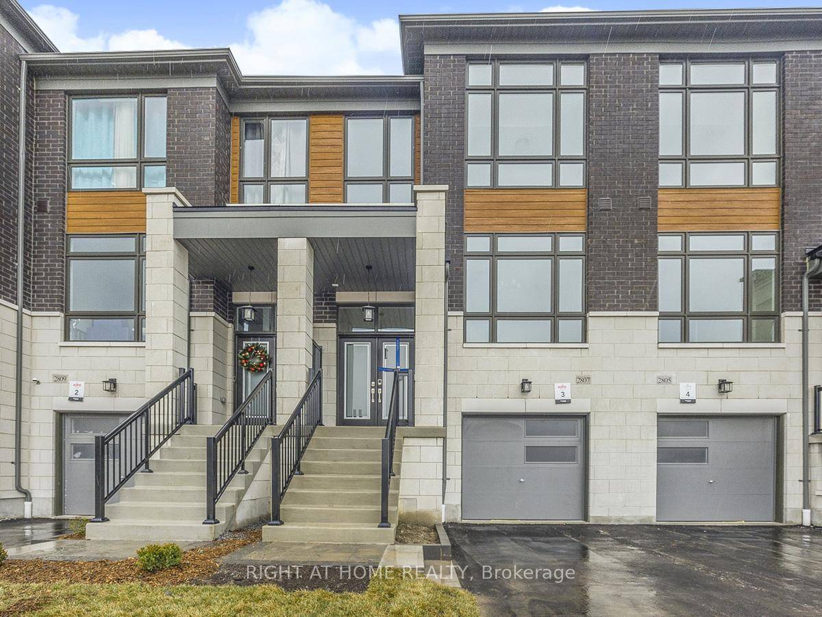 Brand new modern townhouse with back to ravine in desirable new development area.