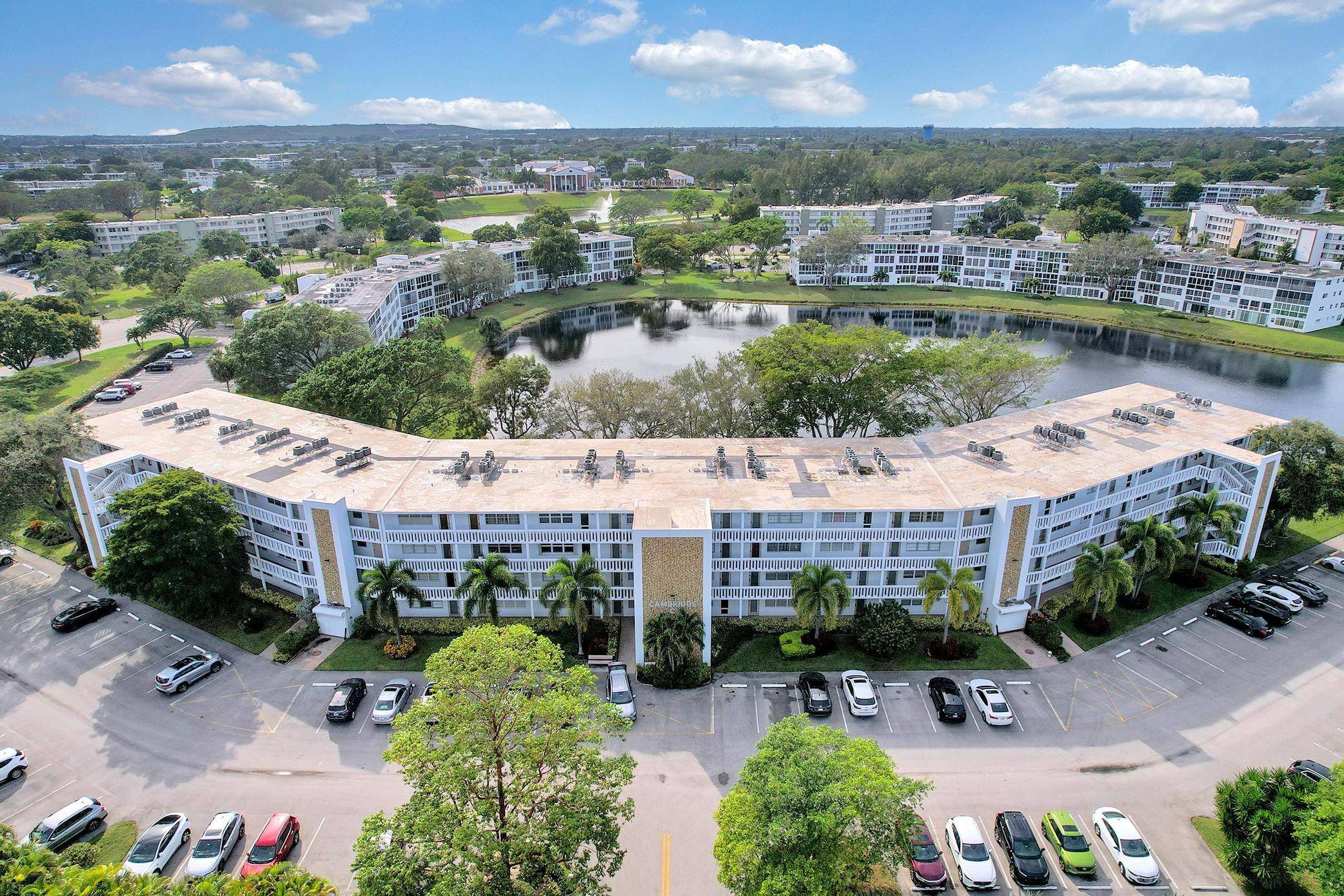 This 1 bedroom, 1. 5 bathroom condo in Century Village, a 55 gated community in Deerfield Beach, offers a serene water view and access to a vibrant lifestyle.