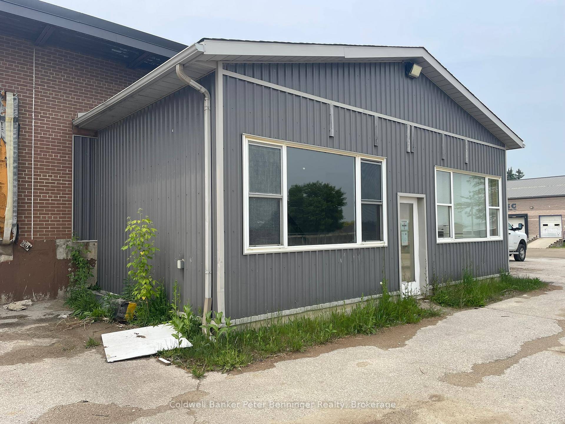 Entrance area is 28'. 10 x14', this would make a perfect office customer service area, section behind is 107'x 23'.