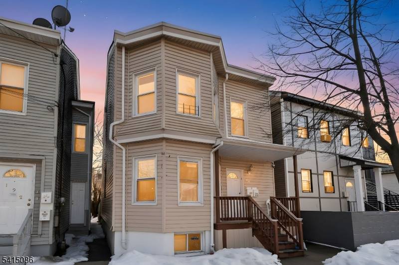 INVESTOR'S DREAM FULLY VACANT two family home offering four floors of living space !