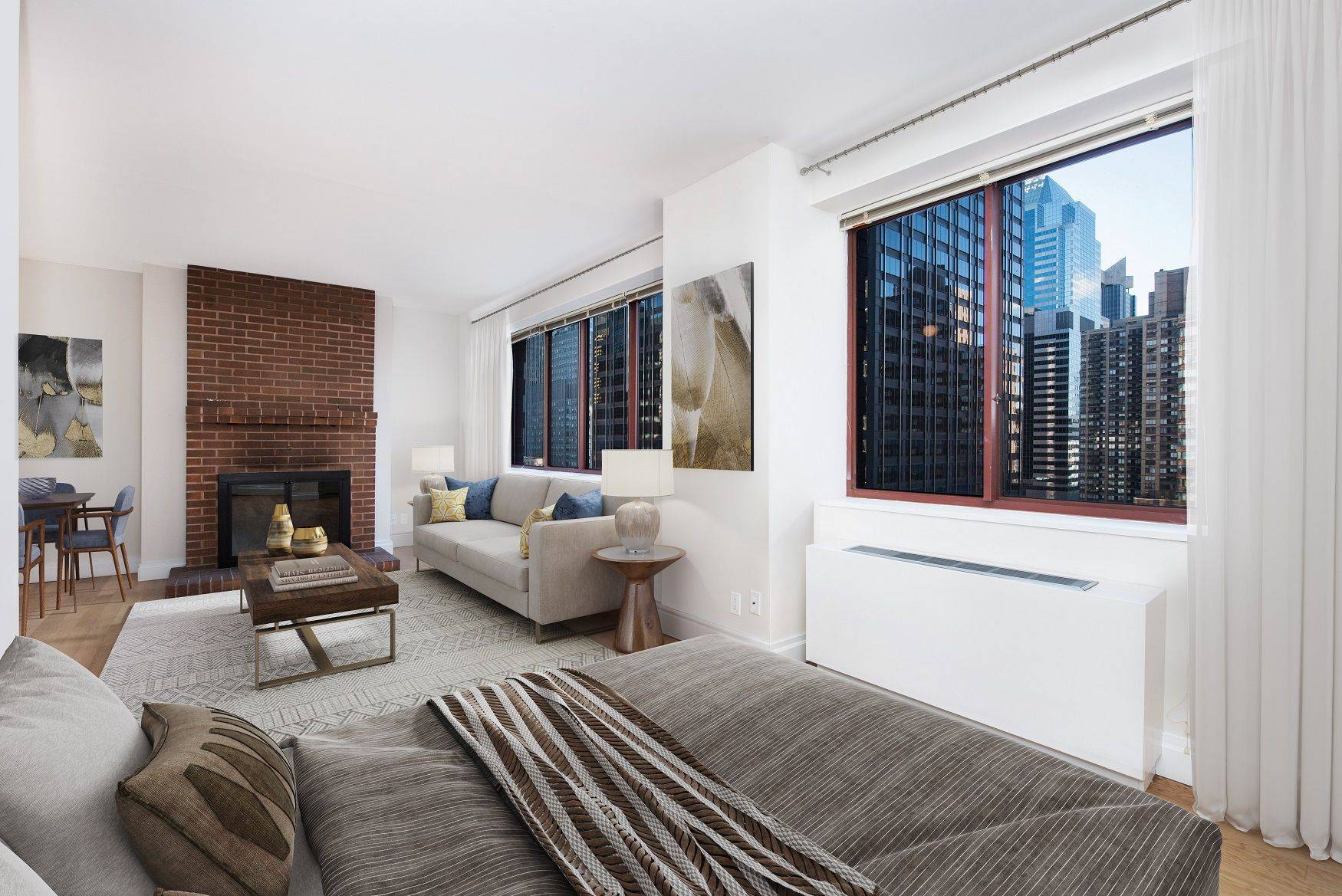 Spacious studio with windowed sleeping alcove.