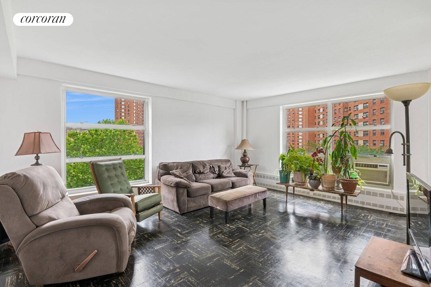 WOW ! Perched up on the 8th Floor, this large, freshly painted 2 bedroom, 1 bath apartment has the floor plan you've been looking for to make your own.