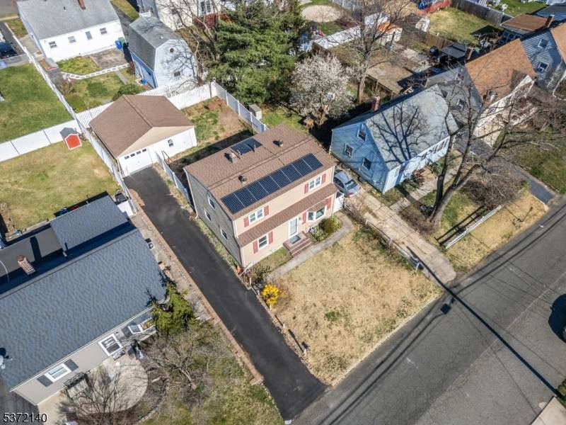 This spacious and updated Cape style home offers five bedrooms and three full bathrooms, with one on each level for added convenience.