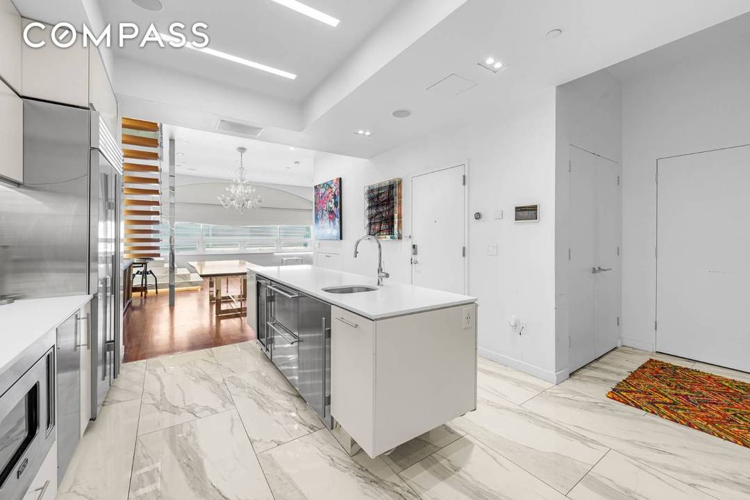 Exceptional Tri Level Condo Package in Prime East Village Location Rare opportunity to own three seamlessly connected condo units in a 7 story, 4 unit loft conversion near Union Square.