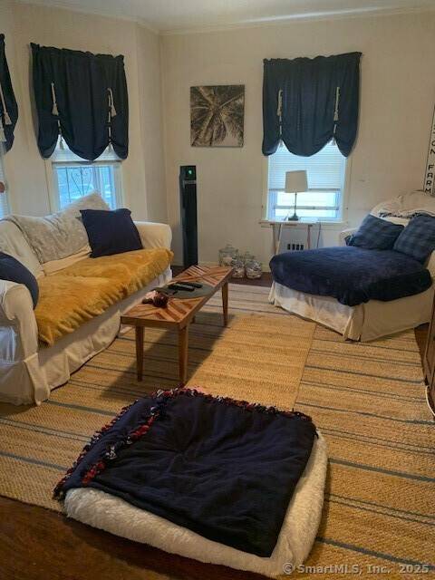 Great Black Rock legal two family home with a third floor accessory apartment currently being rented with the second floor.