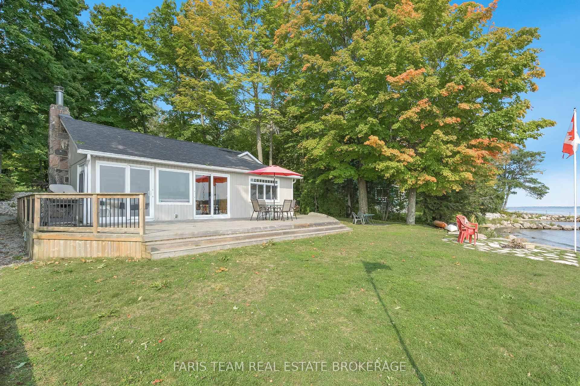 Top 5 Reasons You Will Love This Home 1 Unique waterfront property offering a haven of serenity, combining peaceful ambiance with enjoyable features, including its own private beachfront and a ...