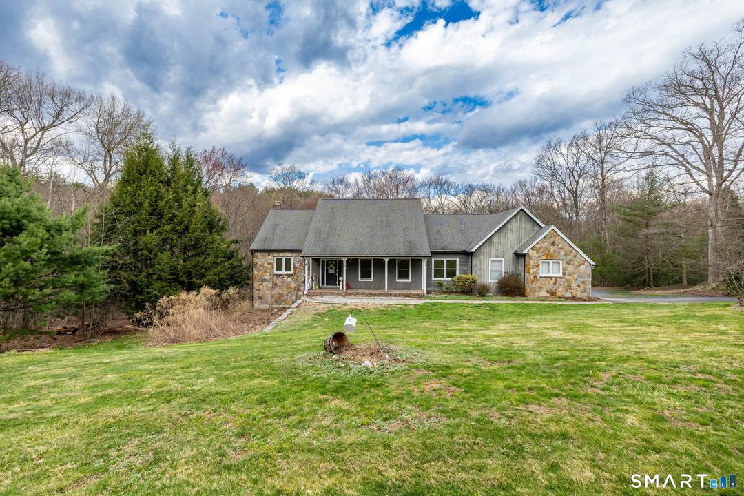 Tucked away on a quiet cul de sac in desirable North Granby, this spacious 4 bedroom home offers the perfect blend of privacy, comfort, and potential.