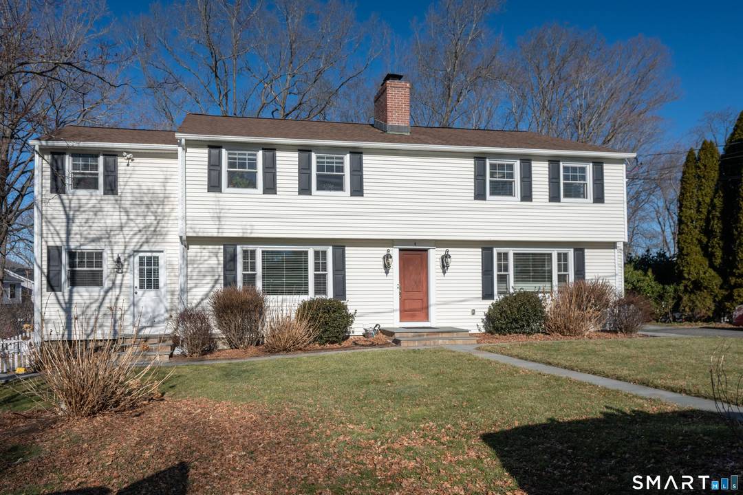 Rare opportunity to own a perfectly updated two family home just steps to Candlewood Lake !