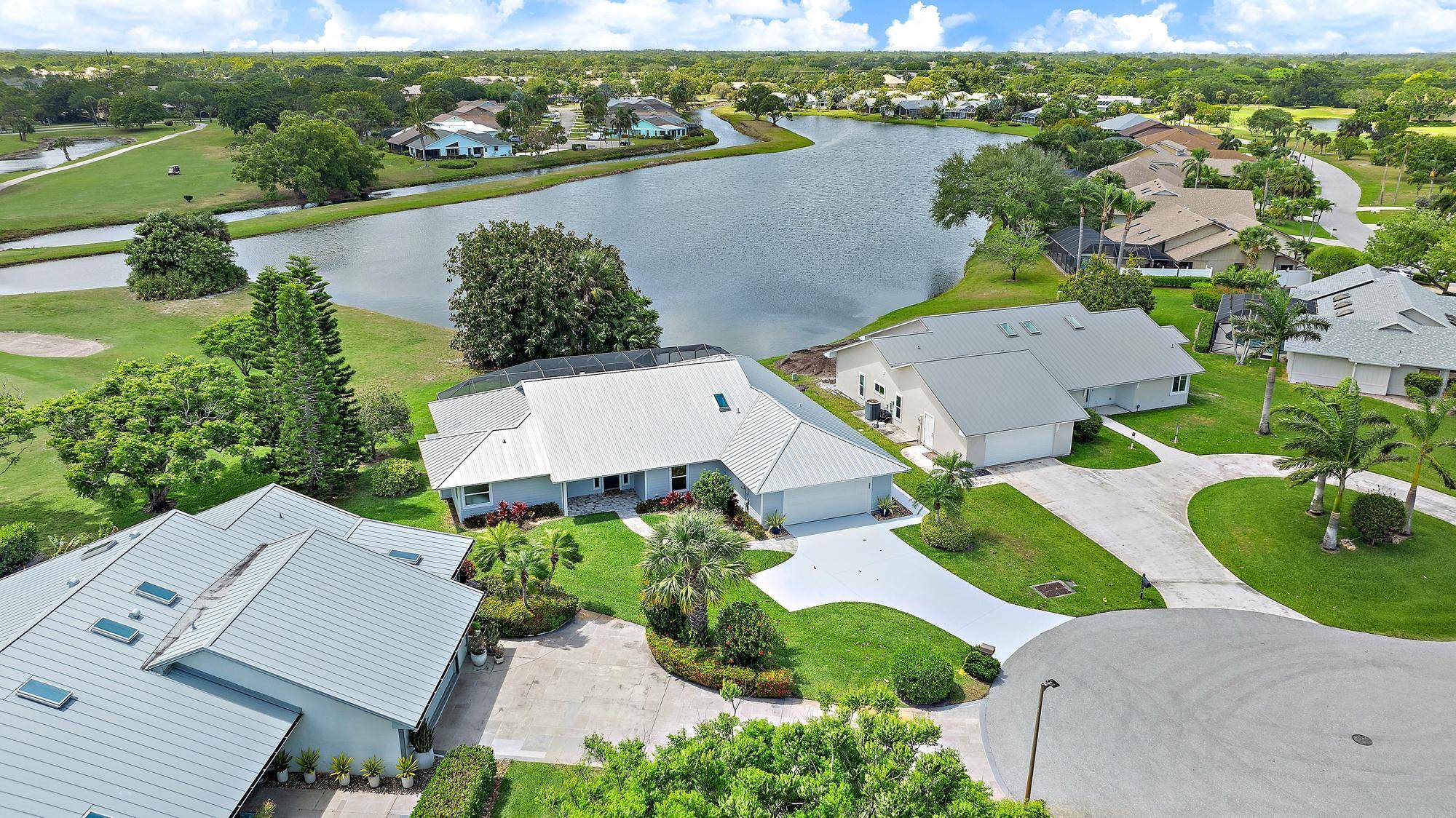 Stunning Lakefront One Story Home w Designer Finishes Throughout Optional Golf Membership Only 1, 750 !