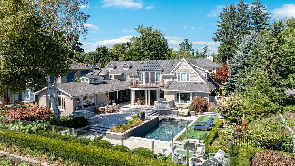Step into a world of refined luxury and sophistication in this stunning waterfront property, where panoramic views of the city skyline captivate from the moment you enter.