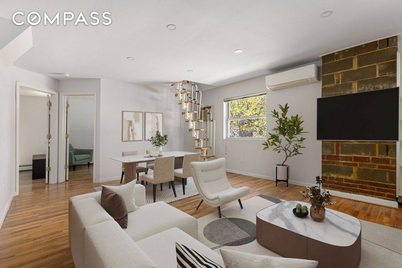 Renovated 3 bedroom with large private rooftop terrace and washer dryer in unit !