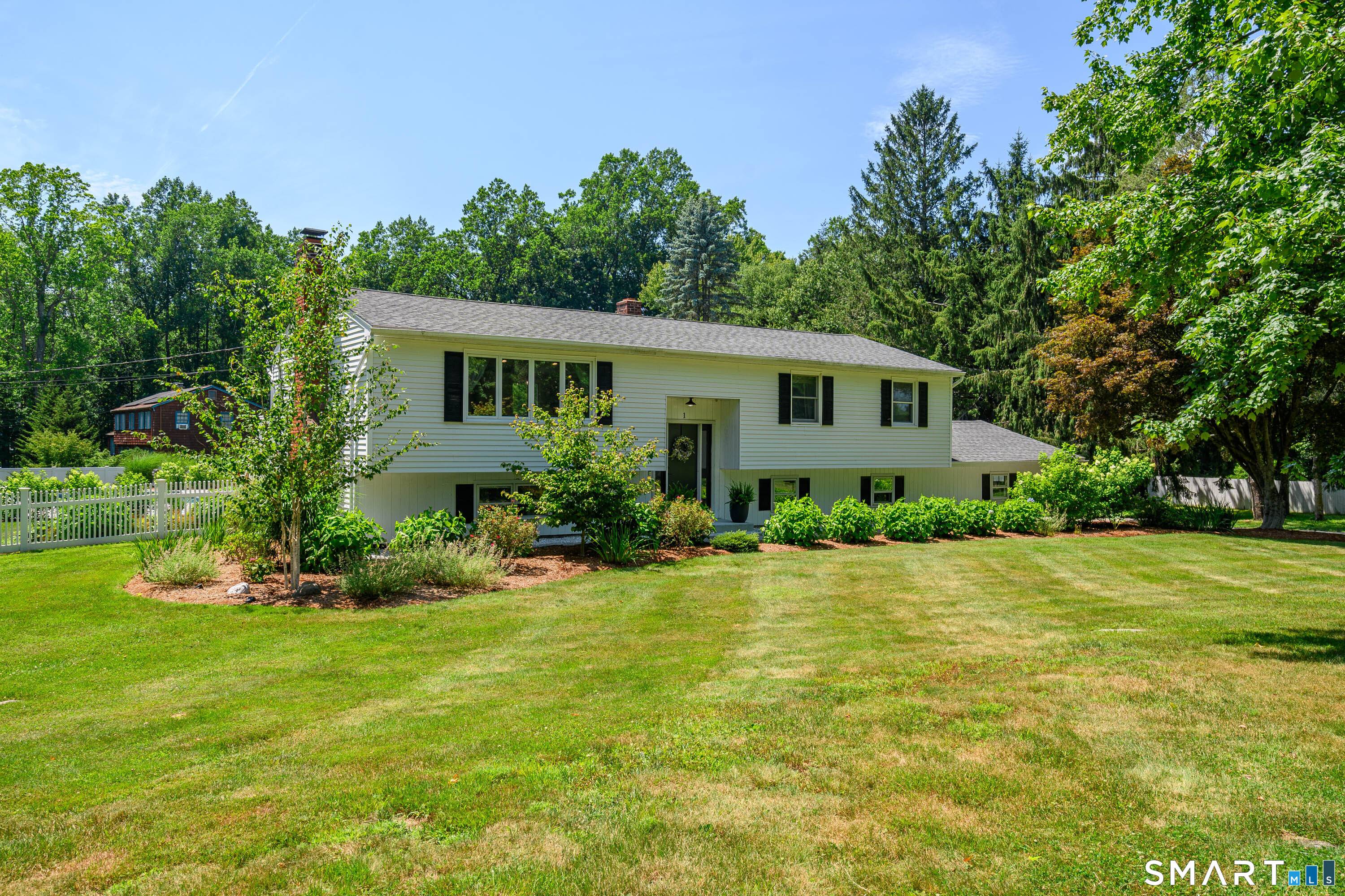 Welcome to 1 Brookwood Drive, a beautifully renovated home designed for today's lifestyle with a fresh, contemporary feel.