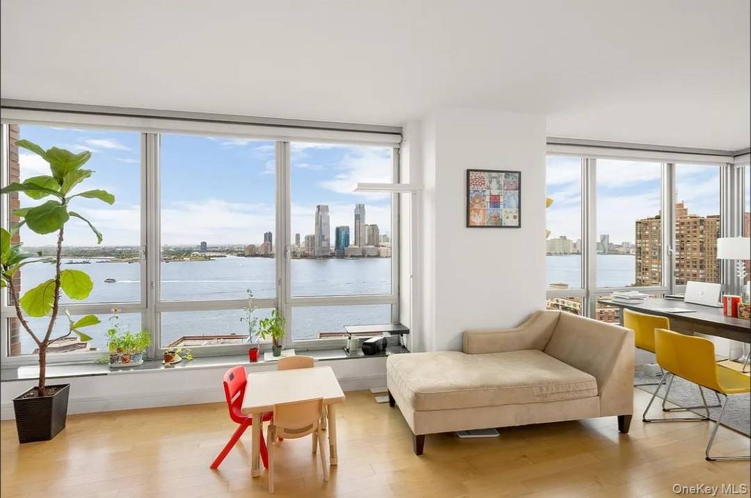 Spacious and light filled 3 bedroom, 3 bath residence in a premier Battery Park City high rise, offering 1, 690 SQFT of refined living space.