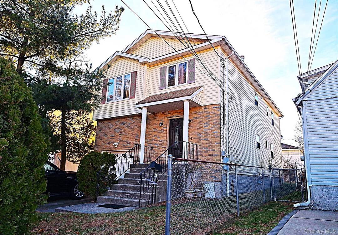 Fantastic Cape Cod style home with a full basement, detached garage, and exceptional potential.