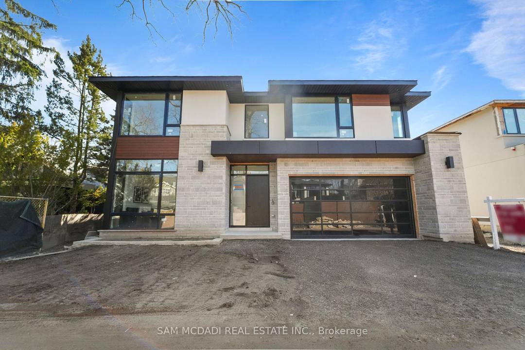 Nestled just moments from the shores of Lake Ontario in the prestigious Rattray Park Estates, this newly built residence offers over 6, 100 SF of meticulously curated living space.