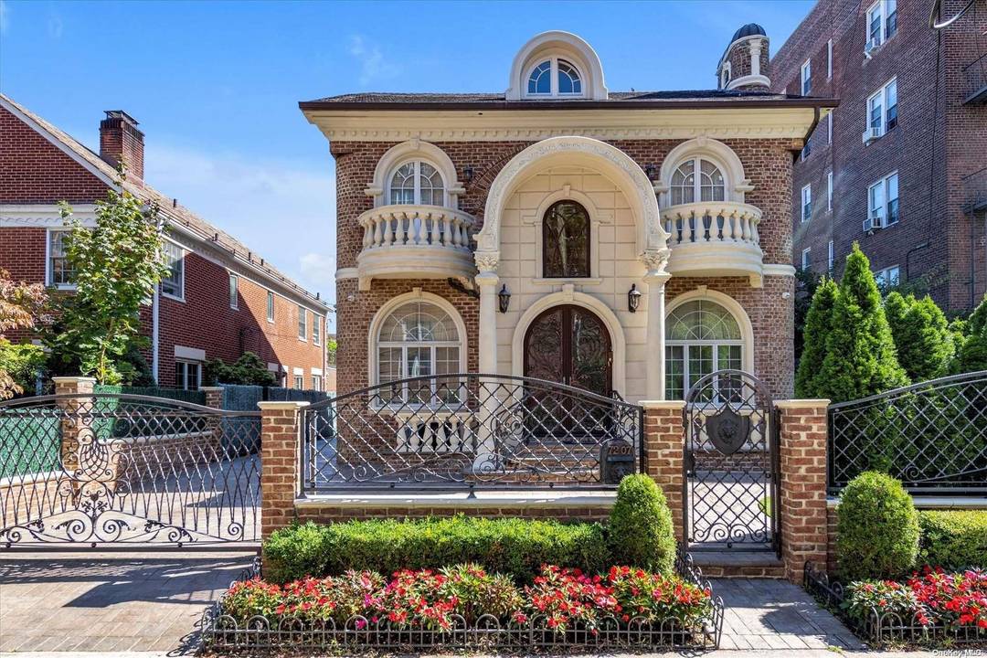 Discover unparalleled luxury in the heart of Forest Hills with this masterfully crafted residence.