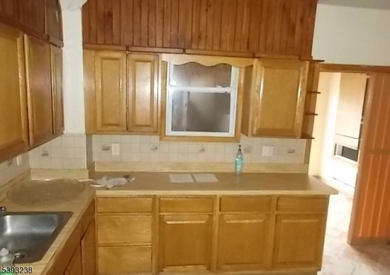 Spacious one family home with endless potential.