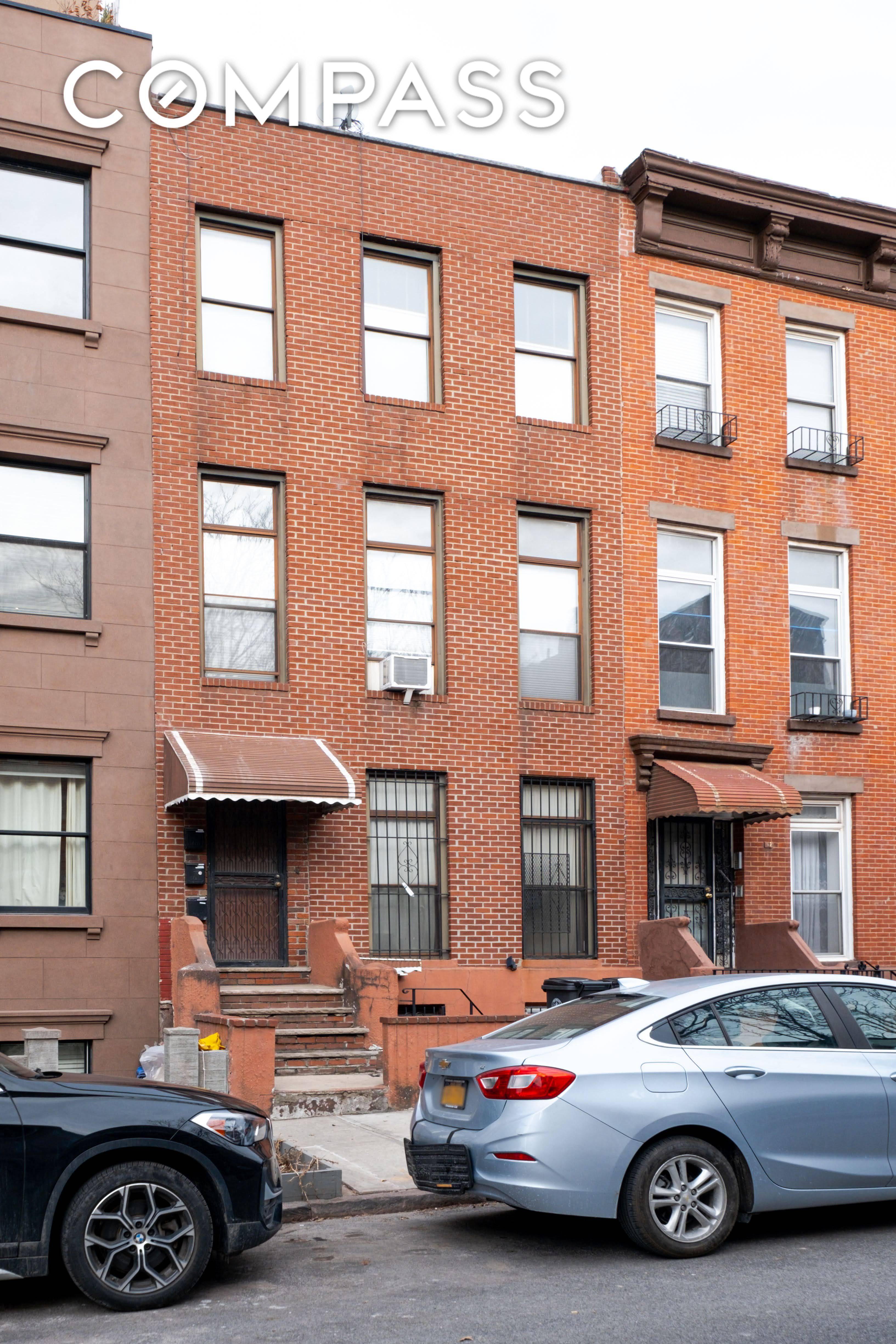 Investment Opportunity 4 Unit Multifamily Home in Columbia St Waterfront District This solid brick 4 unit property features 7 bedrooms and 4 bathrooms and is filled with natural light throughout.