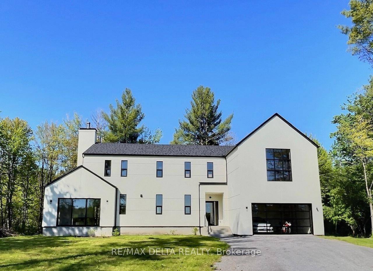 Step into this beautiful custom built home, where sophisticated design meets modern comfort.