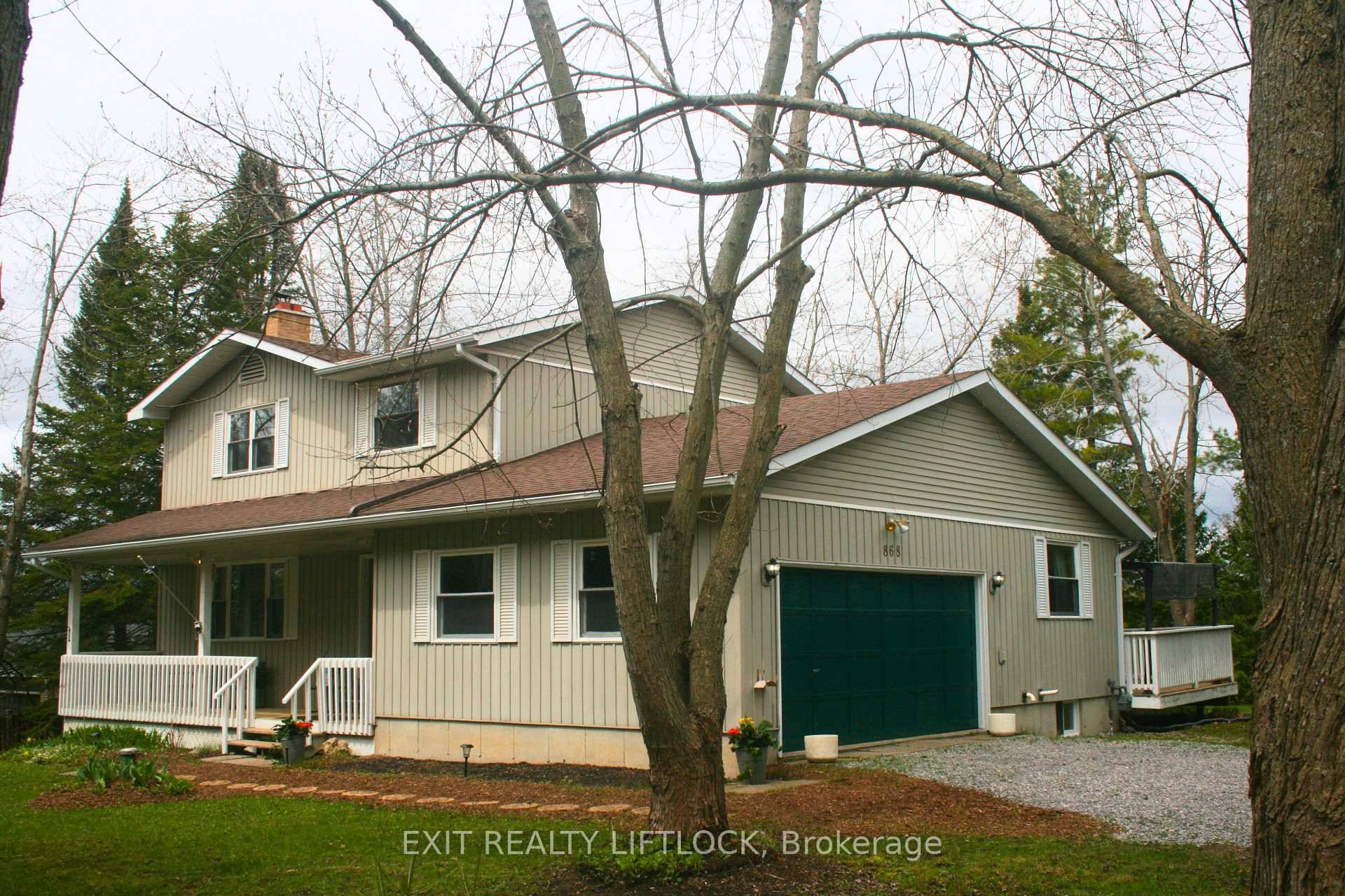 Welcome to 868 Lily Lake Rd, a charming custom built farm style home that offers the perfect blend of privacy, nature, and convenience in the peaceful Selwyn Township.
