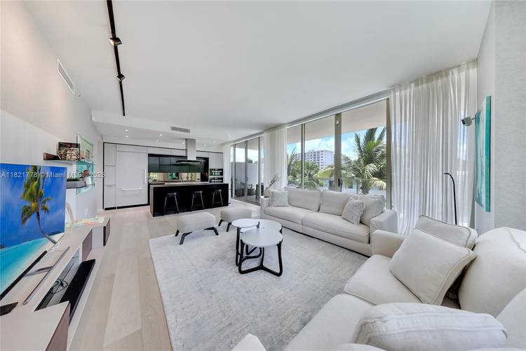 Experience refined luxury at 300 Collins, an exclusive 19 residence boutique building nestled in prestigious South of Fifth.