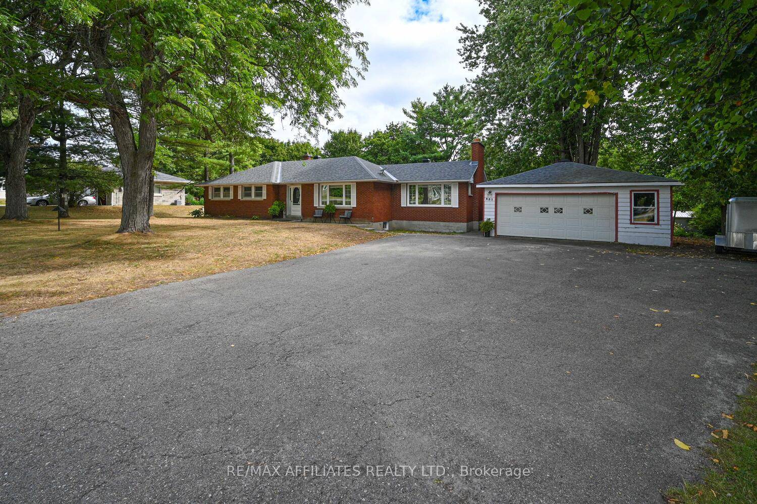 Welcome to 451 Hwy 29 ! This charming 3 bedroom, 2 bath, all brick bungalow with detached 2 car garage is ideally located in Rideau Lakes Township, just 2 minutes ...