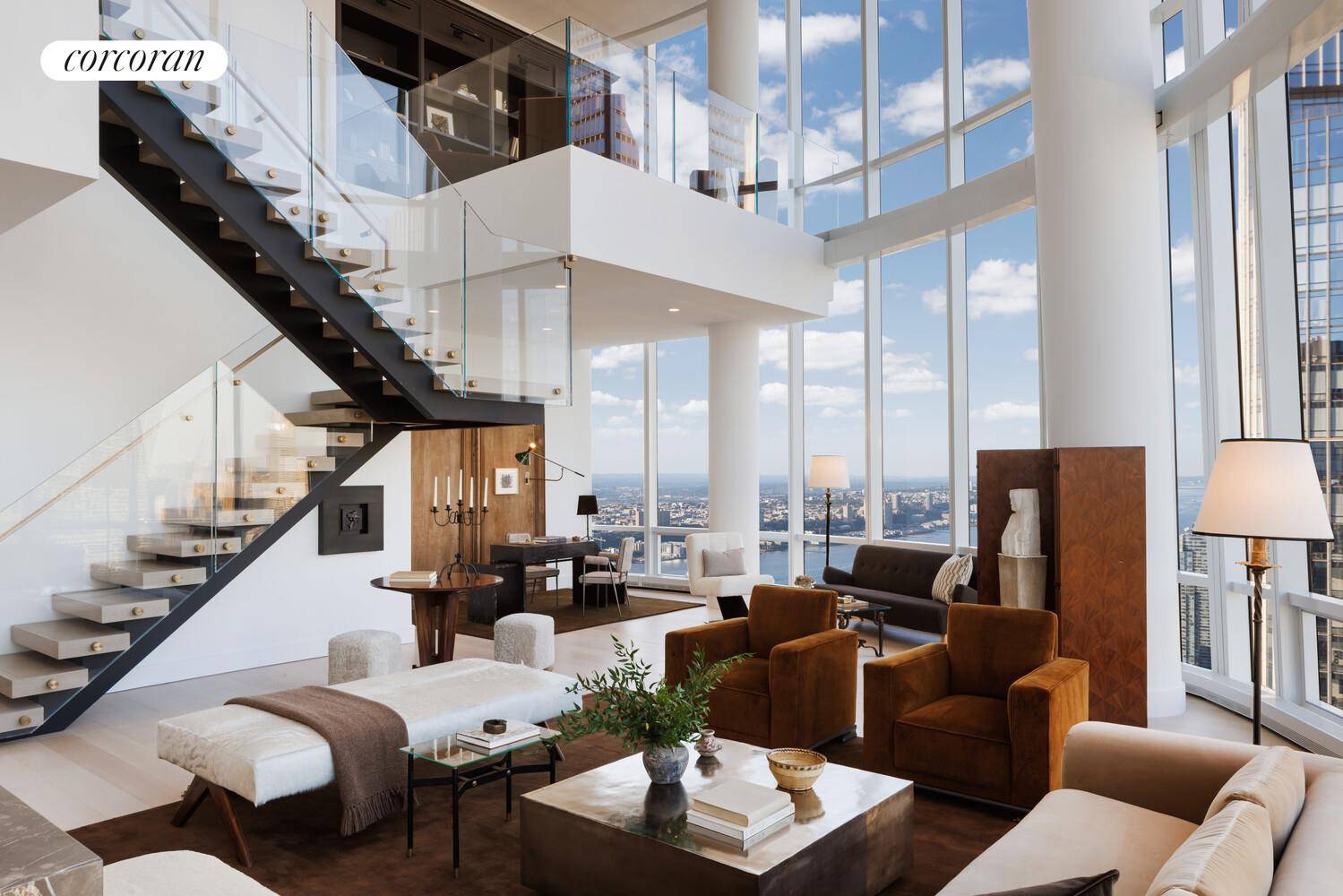 DOUBLE HEIGHT DRAMA WITH SWEEPING VIEWS OF THE NEW YORK CITY SKYLINE FROM EVERY ROOM.