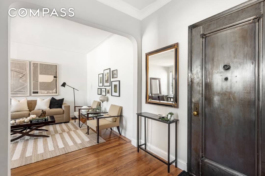 Top Floor With Elevator East Village Pre War Charmer with Modern Comforts This one bedroom home, perched atop a boutique, elevator, pre war cooperative building is the epitome of timeless ...