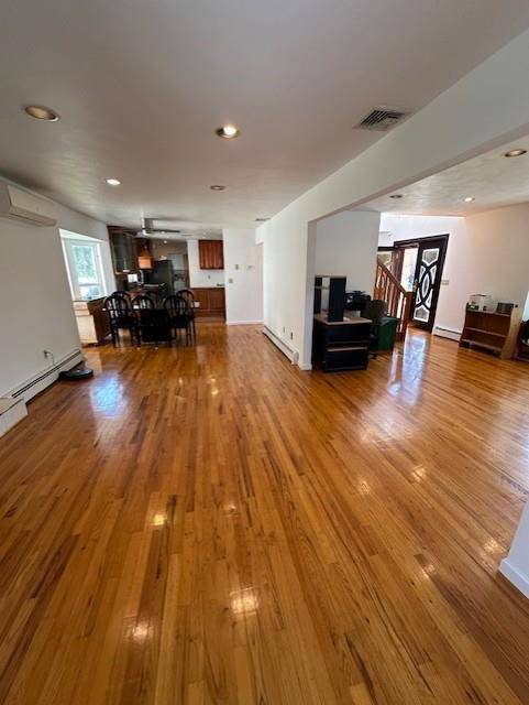 IMPRESSIVE MODERN 4 BEDROOM COLONIAL PRIVATELY LOCATED ON ONE THE NICEST BLOCK IN ROSLYN HEIGHTS.