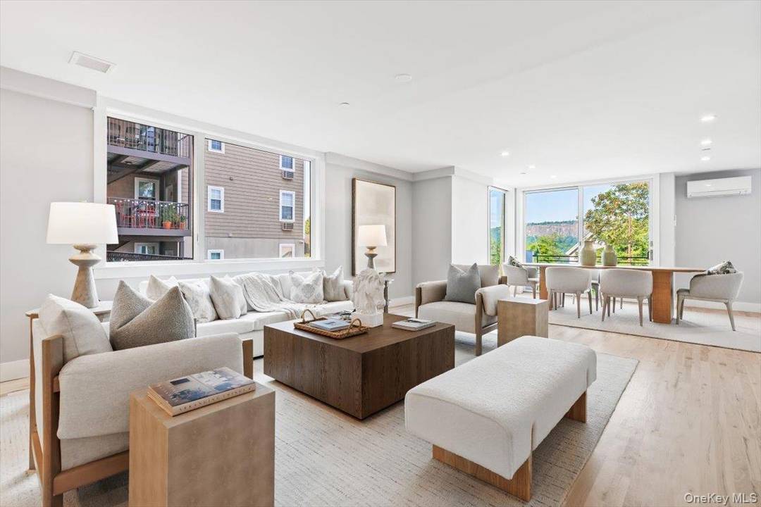 NEW CONSTRUCTON Discover Hudson Vista Townhomes, where elevated living meets unparalleled natural beauty.