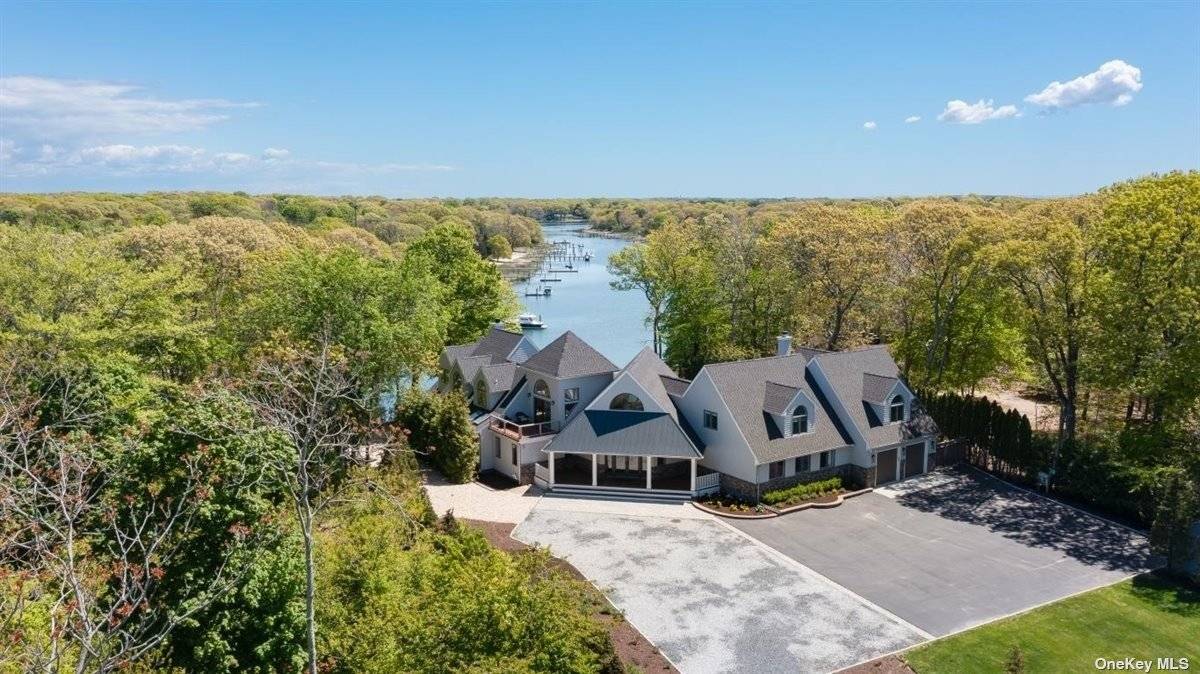 Luxurious waterfront Post Modern home on 3.