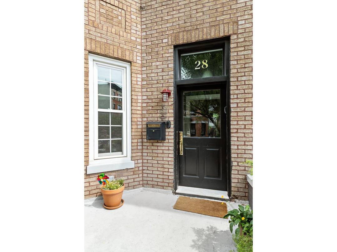 Amazing opportunity to purchase a renovated townhouse with period details on a charming one block street in Ditmas Park.