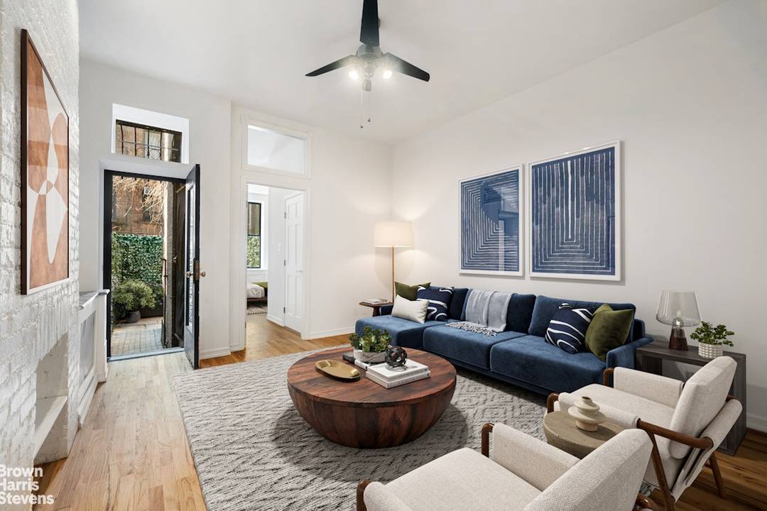 YOUR OWN SECRET GARDEN Wonderfully affordable two bedroom apartment with two full bathrooms and your own secret garden, perfectly situated in the vibrant heart of Hell's Kitchen.