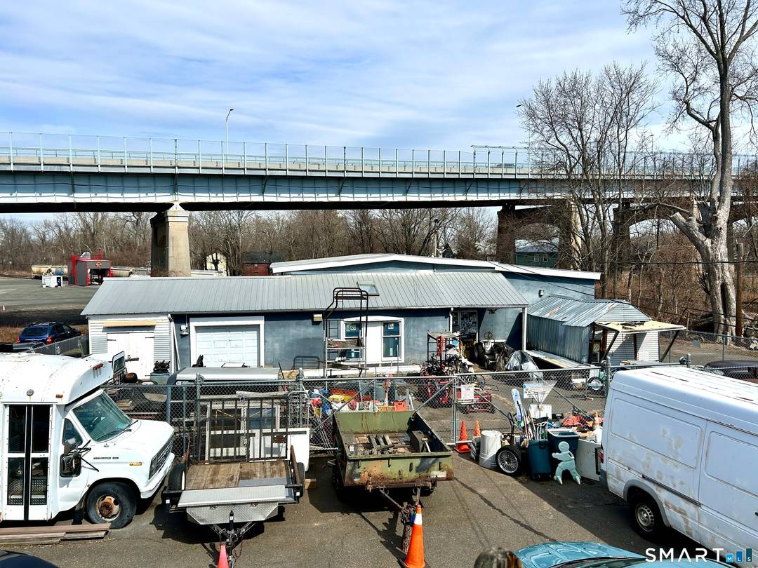 High Yield Multi Asset Investment Opportunity, CT Positioned in Middletown, this rare, income producing portfolio features two 2 family homes 4 total units, a 2, 898 sq ft workshop, and ...
