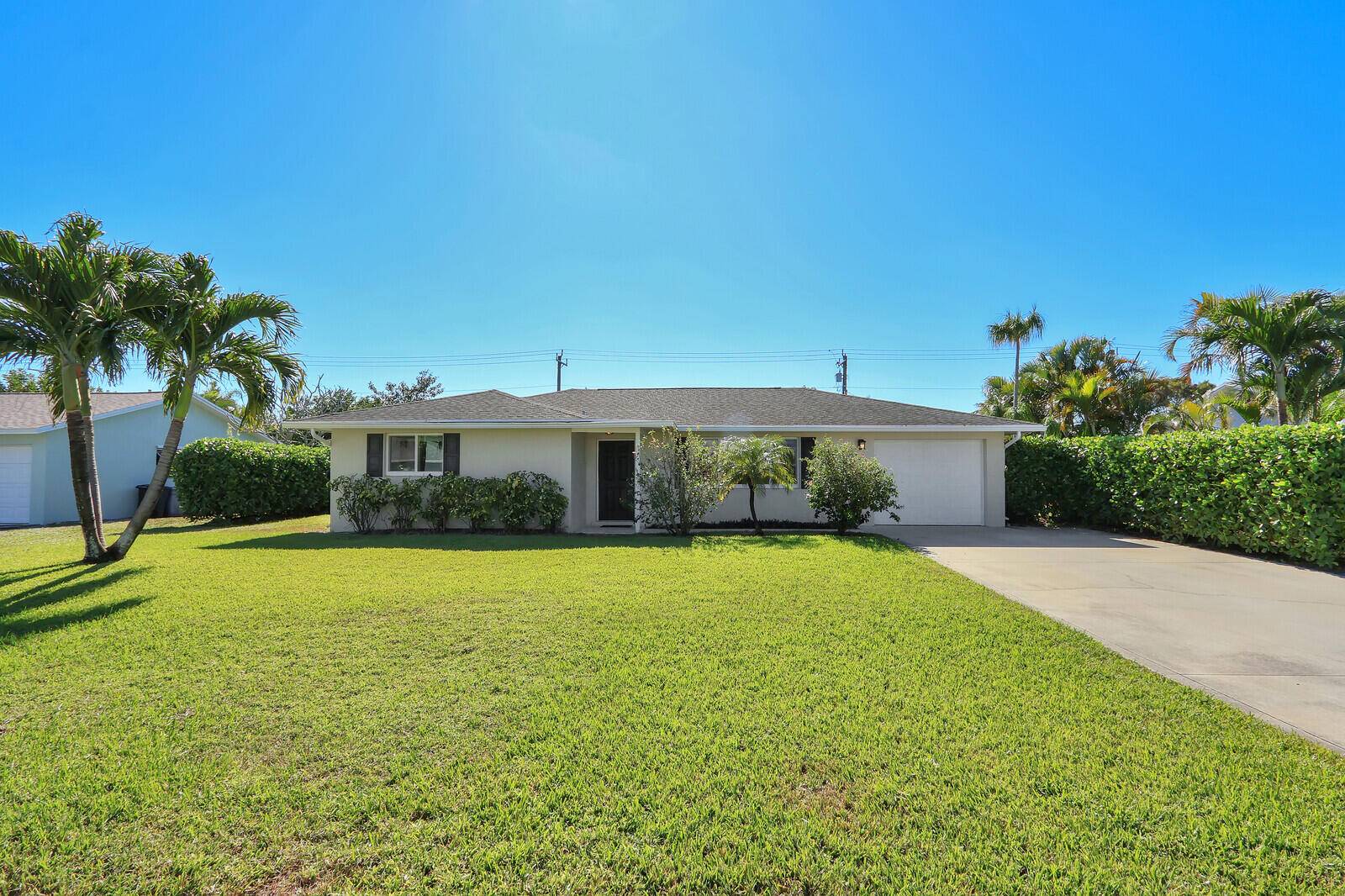 Move in ready home in peaceful prime location in the heart of Tequesta.