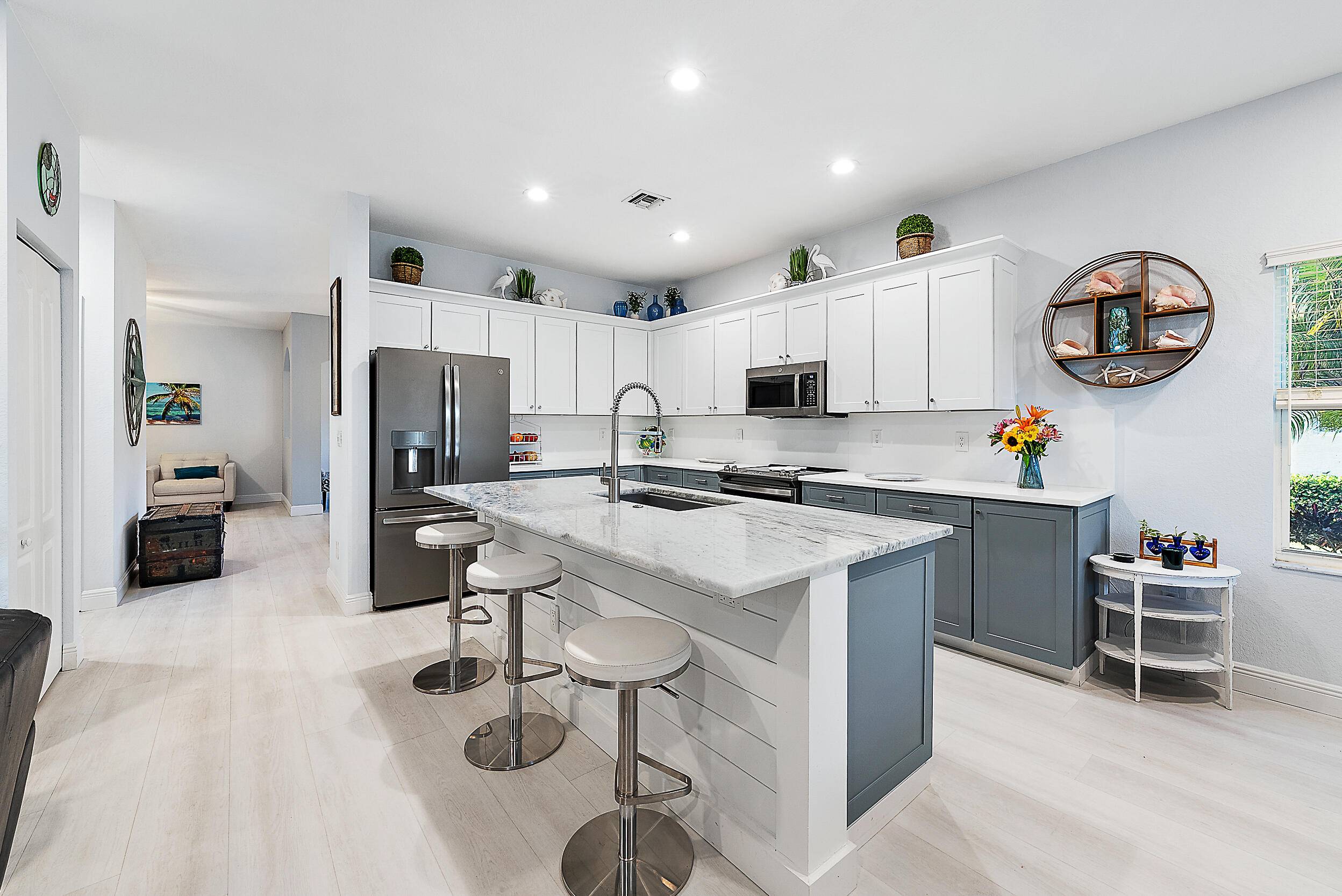 Completely renovated CBS one story lakefront home in the highly desirable gated community of Rialto in Jupiter.