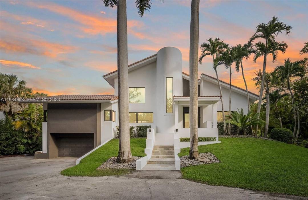 Experience a residence of true presence in this fully remodeled lakefront estate, perfectly situated within the prestigious guard gated community of Gables Pinecrest by the Sea.
