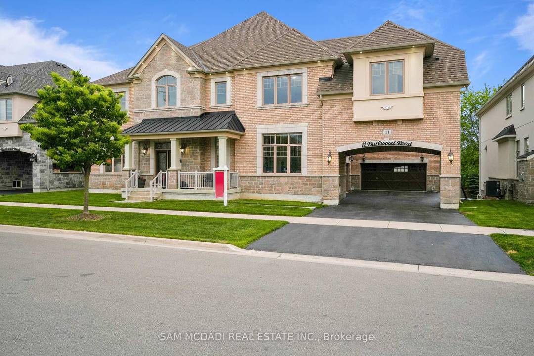 Experience Over 7, 000 sqft of Exceptional Architectural Design In This Immaculate Home, Nestled In The Prestigious Vales of Castlemore.