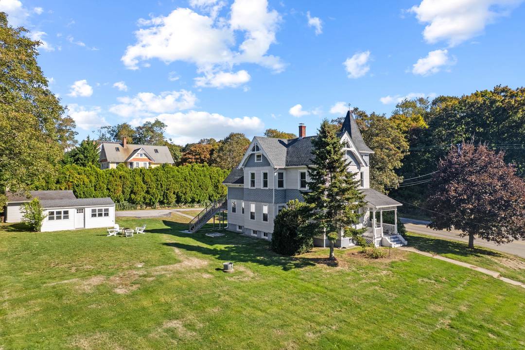 Charming Victorian home offers timeless appeal and spacious living on over half an acre of land.