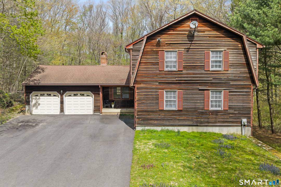 Tucked away in a peaceful, private setting abutting Roosevelt Forest, this spacious 4 bedroom, 2.