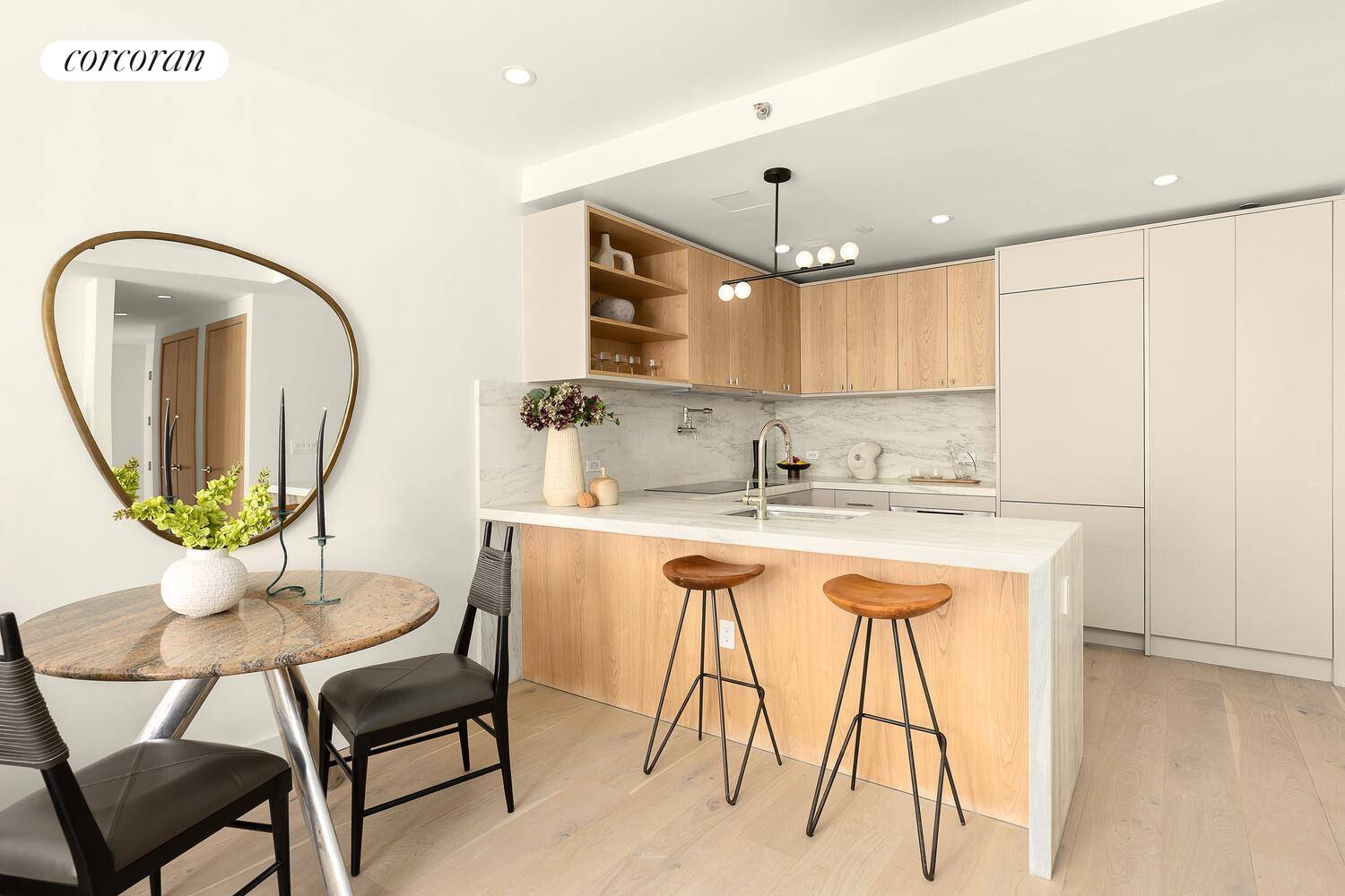 New Greenpoint Condo Building Residence 1A is a spacious three bedroom, three and a half bath condo with double height living room and incredible private outdoor space with a grill.