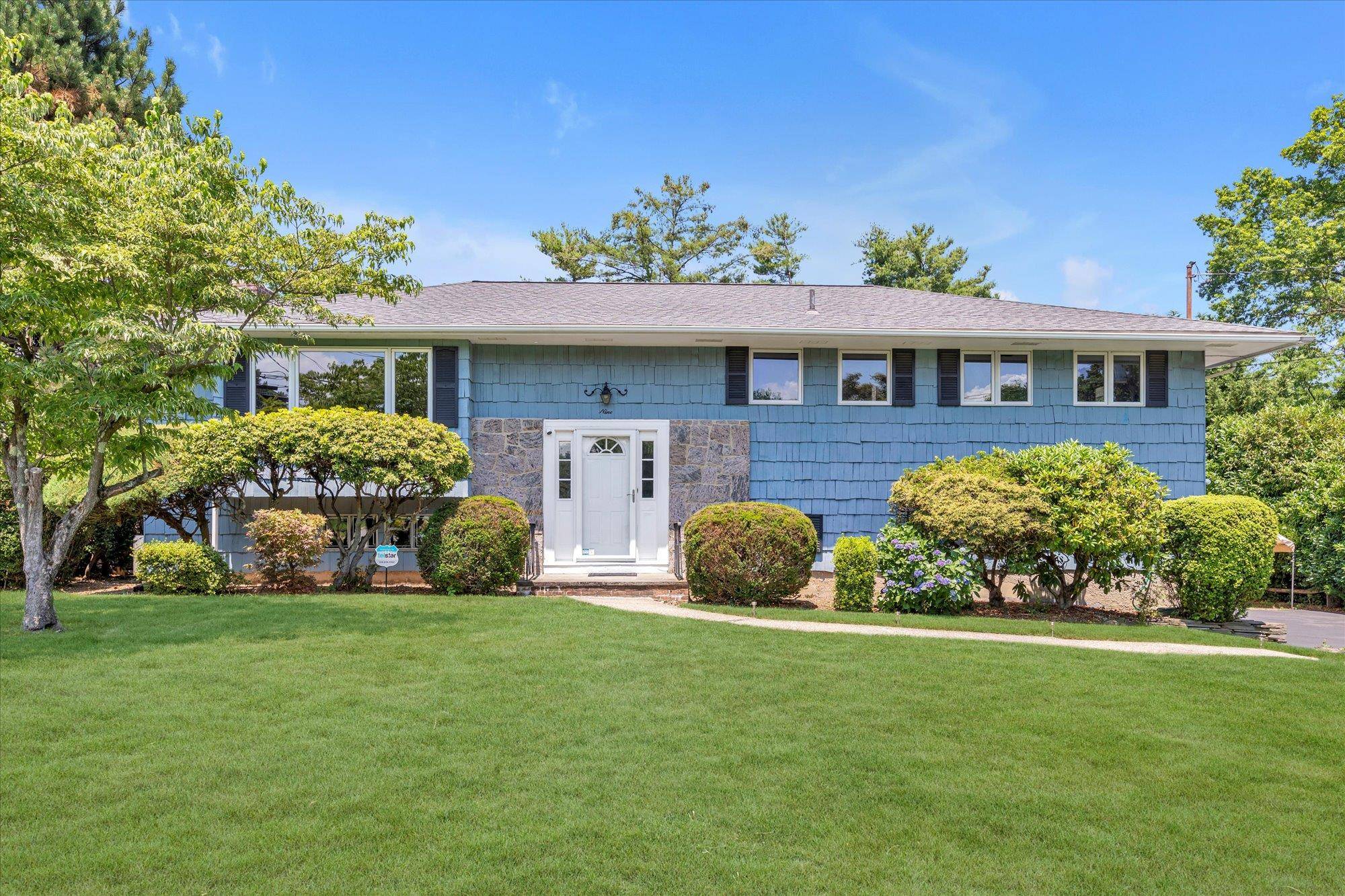 Welcome to this incredible one of a kind opportunity in the heart of Glen Cove perfectly situated on just shy half acre.