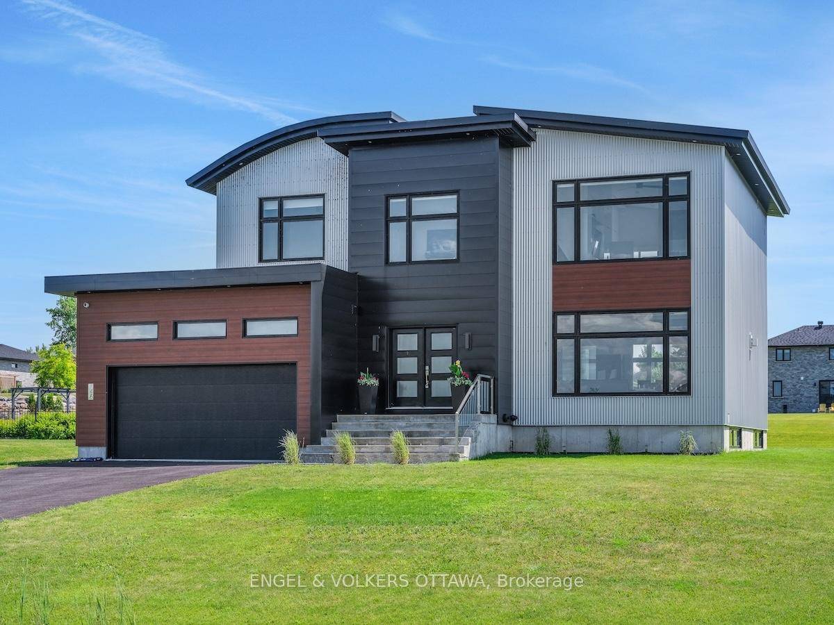 Welcome to this exceptional custom built, automated home, crafted with precision and modern elegance.