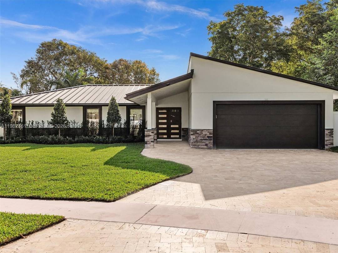 Beautifully upgraded 4 bedroom, 2 bathroom home with a 2 car garage situated on a desirable corner lot in Pembroke Pines.