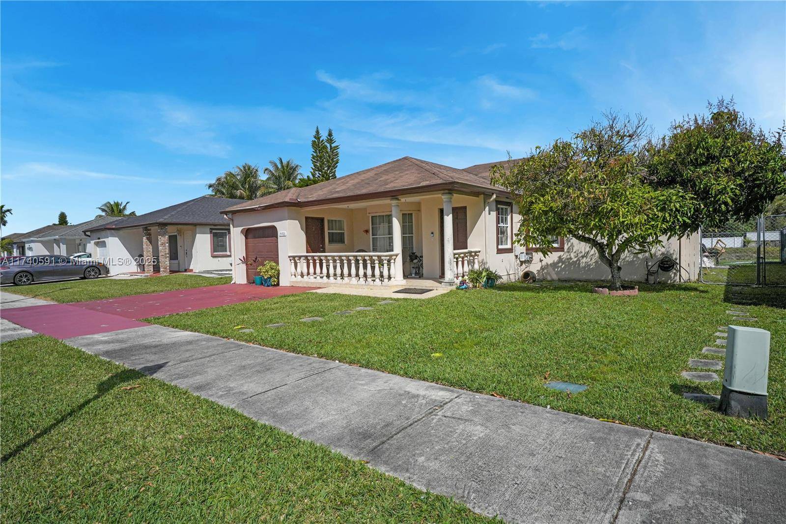 Welcome to this charming 3 bedroom, 2 bathroom canal front home in a quiet Kendall subdivision.