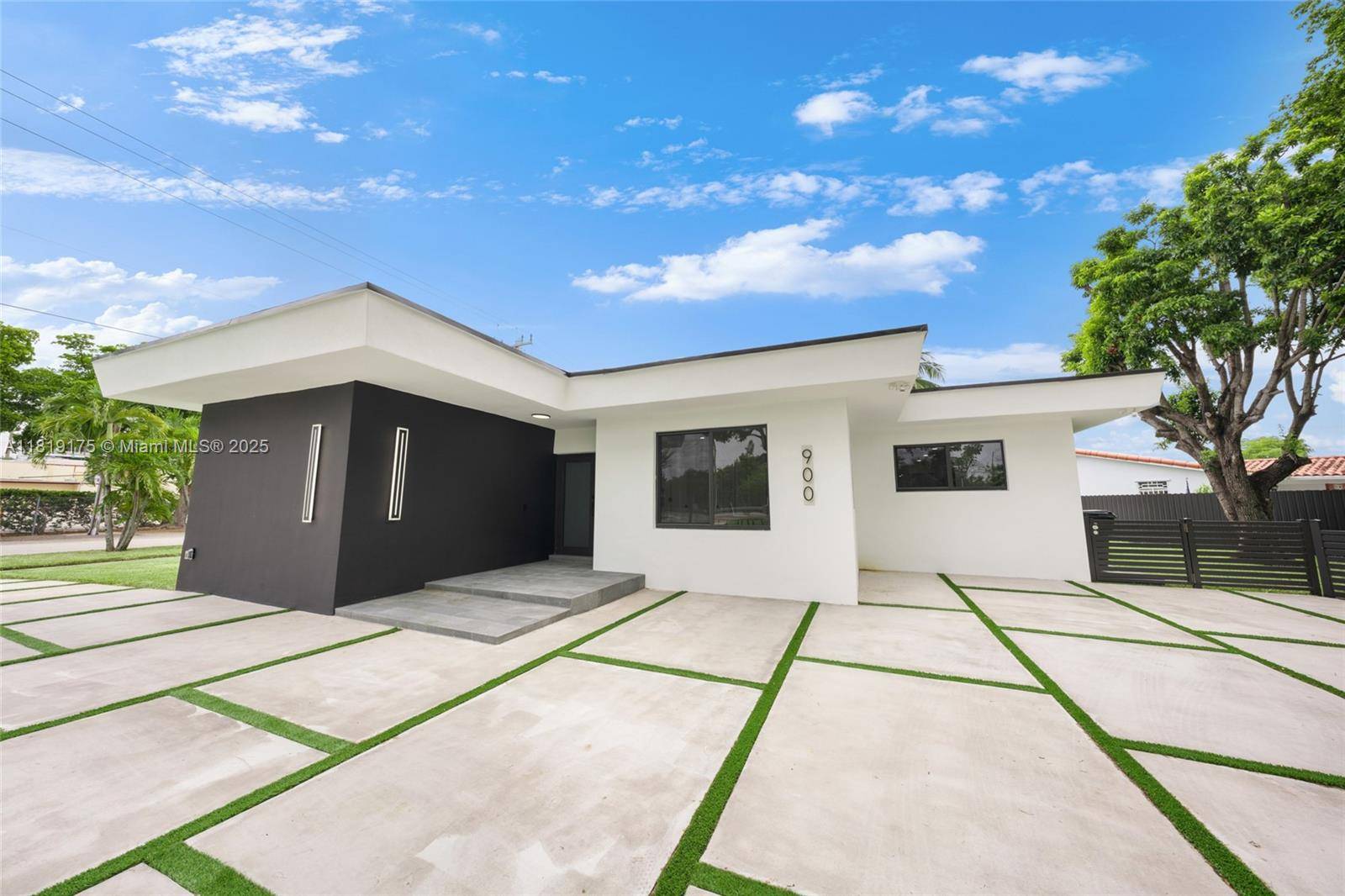 Experience elevated living in this exceptional 4 bed, 4 bath home in the exclusive and family friendly Miami Springs community.