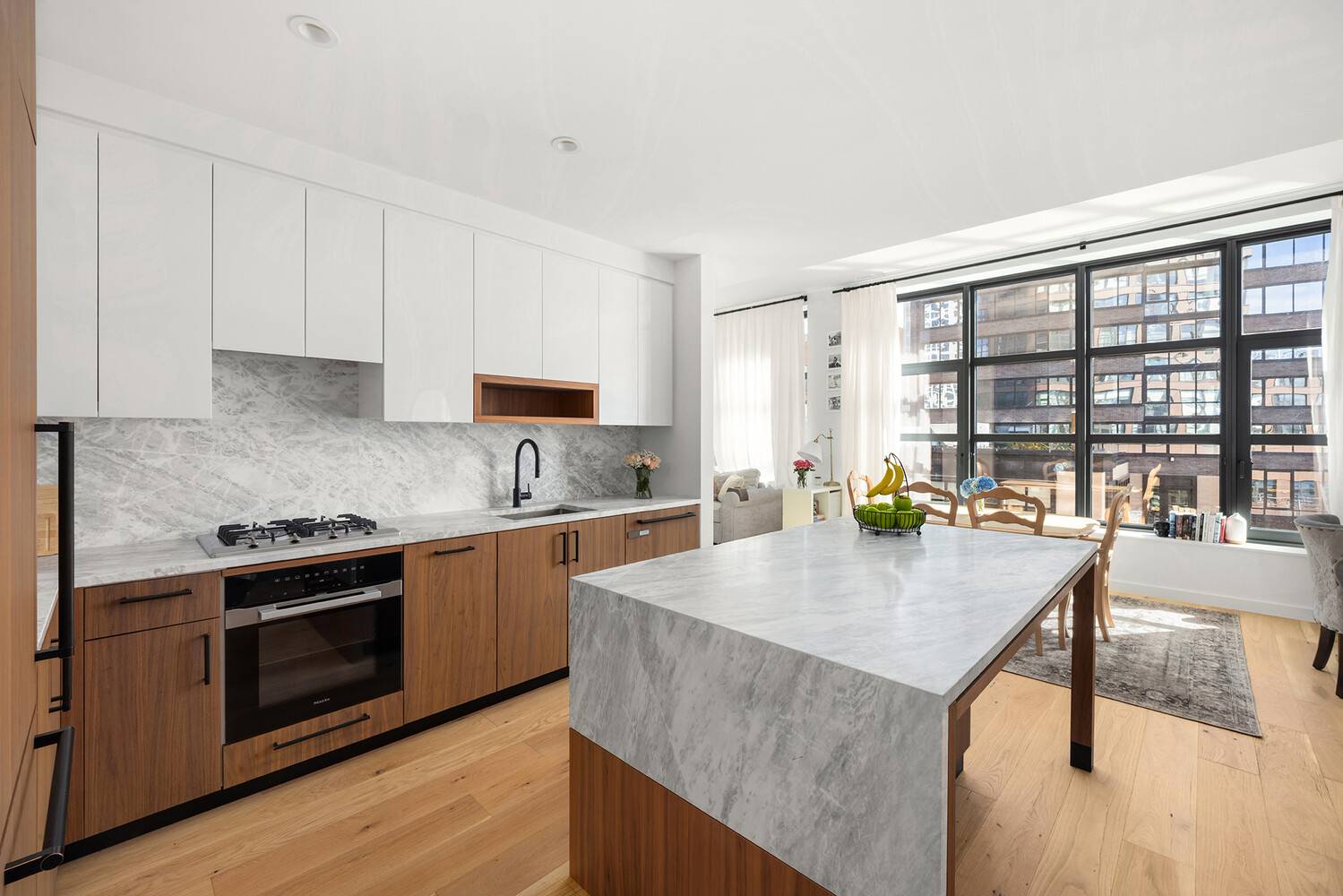 Perfectly positioned on the 4th floor offering intimate connection to the dazzling East River views, this oversized one bedroom residence offers both impressive scale and thoughtful design.