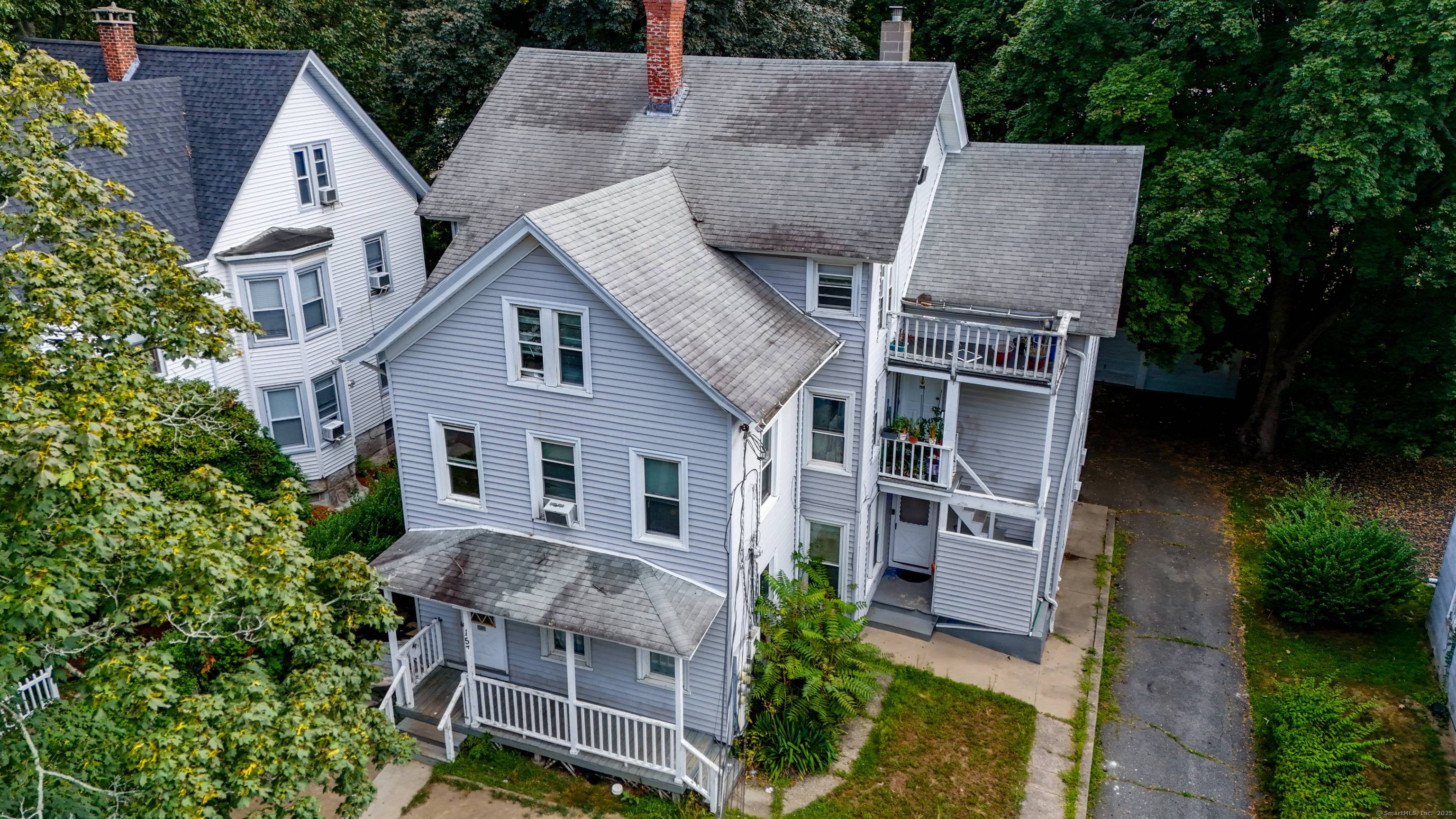 Situated in the New London Opportunity Zone, this zoned Five Family offers great value add investment.